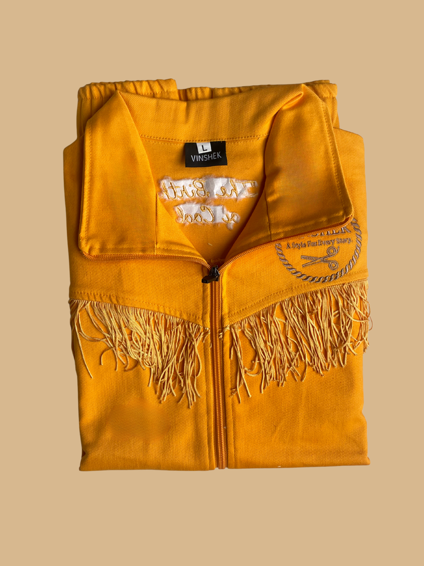 Birth of Cool: Vinshēk Golden Fringe Lux Tracksuit