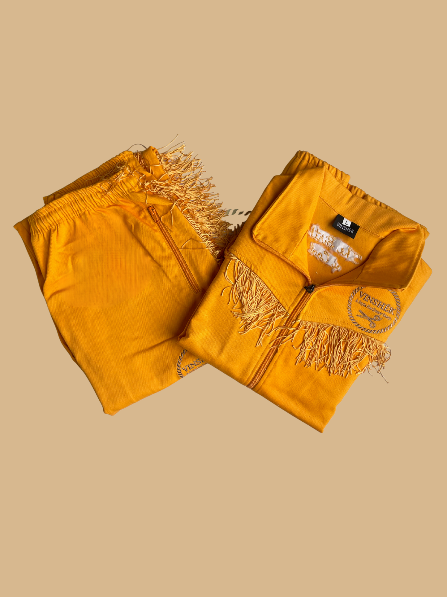 Birth of Cool: Vinshēk Golden Fringe Lux Tracksuit